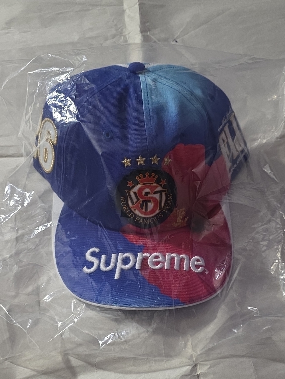 Supreme Blue and Pink Embroidered Crest Baseball Cap fiji water inspired.